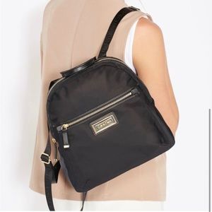 Calvin Klein Black Mini Backpack with Gold zippers